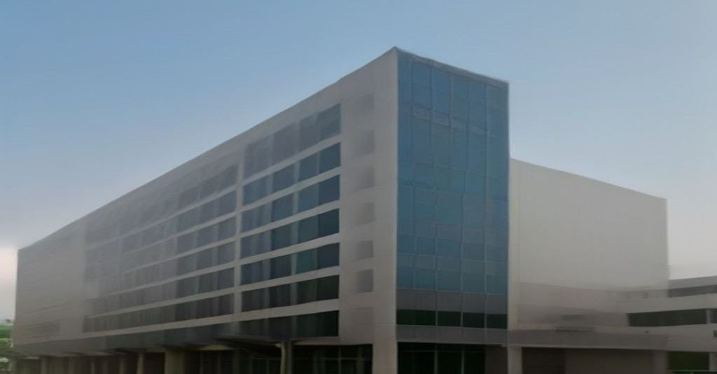 Modern commercial office building in a Gurgaon business corridor suitable for pre-leased investment