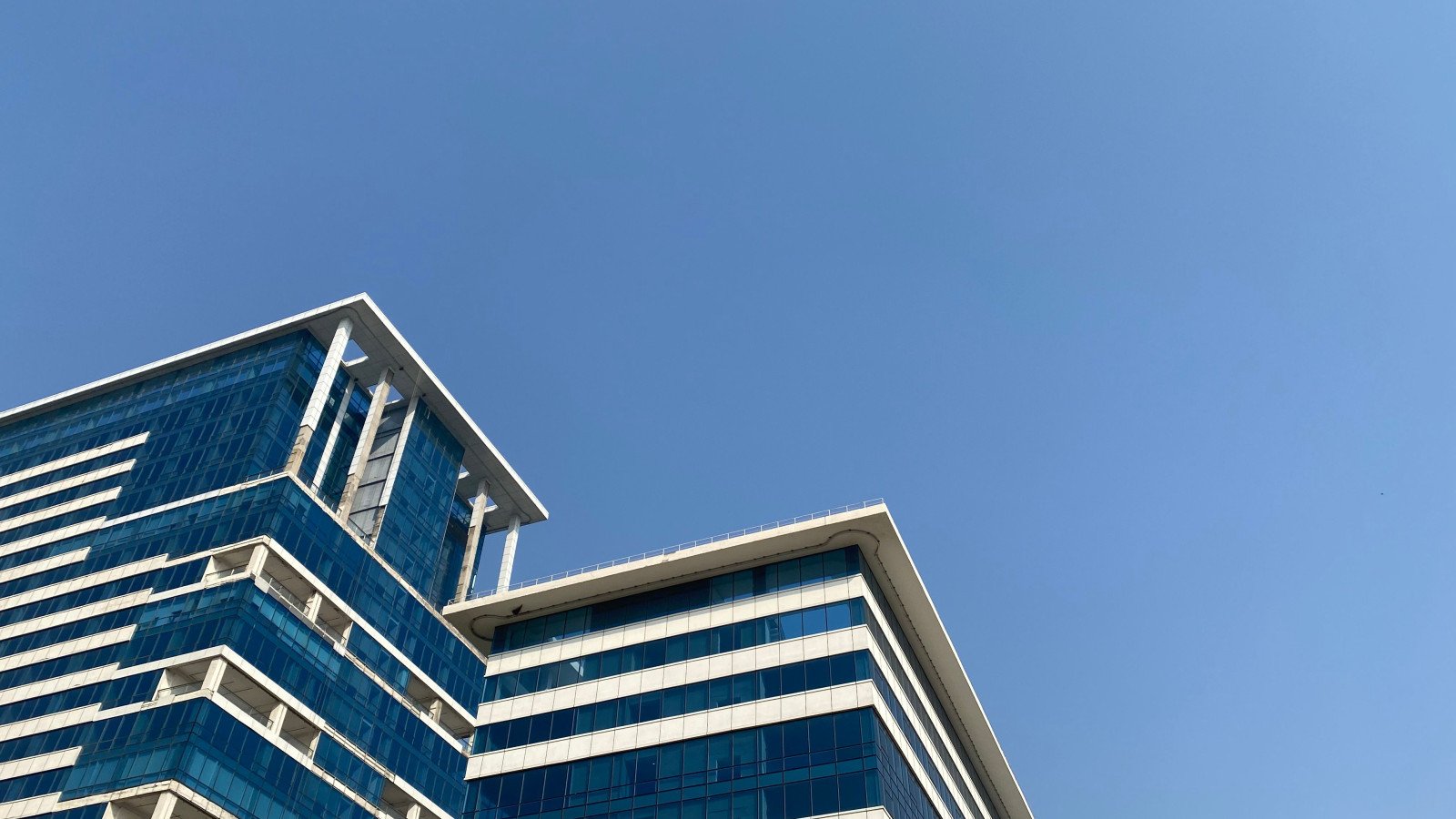 High-rise residential towers in Gurugram, representing NCR homebuyers affected by the RBI's October 2026 repo rate hike.