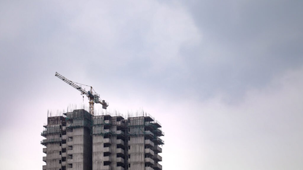 A high-rise residential building under construction in India, representative of projects facing RERA possession-delay disputes.