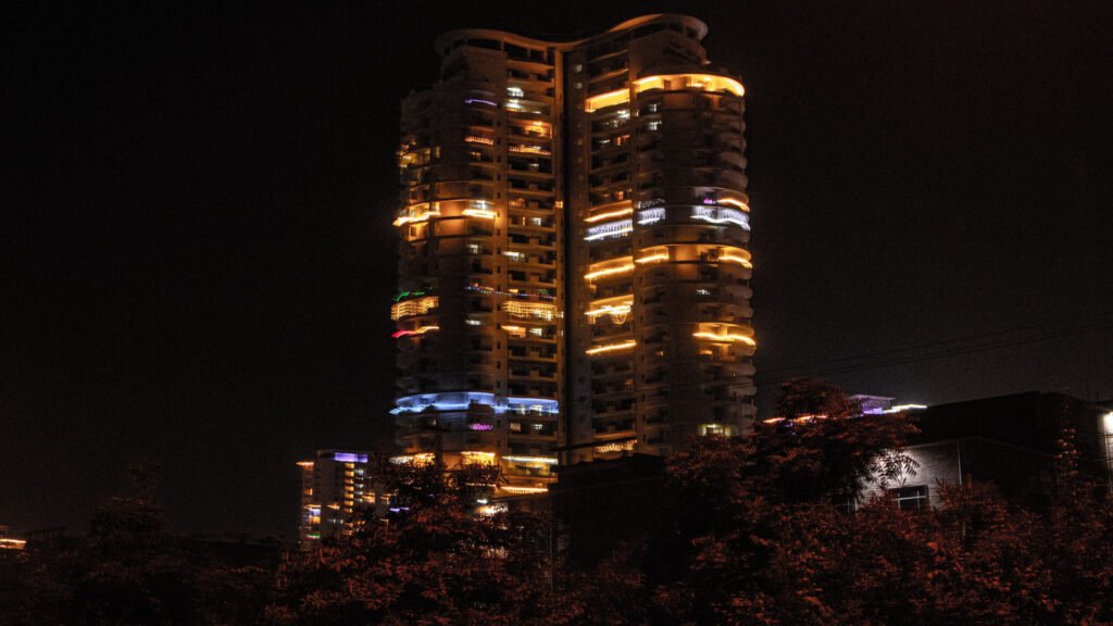 Residential high-rise skyline in Gurugram, India, representative of the Golf Course Extension Road corridor, 2026.