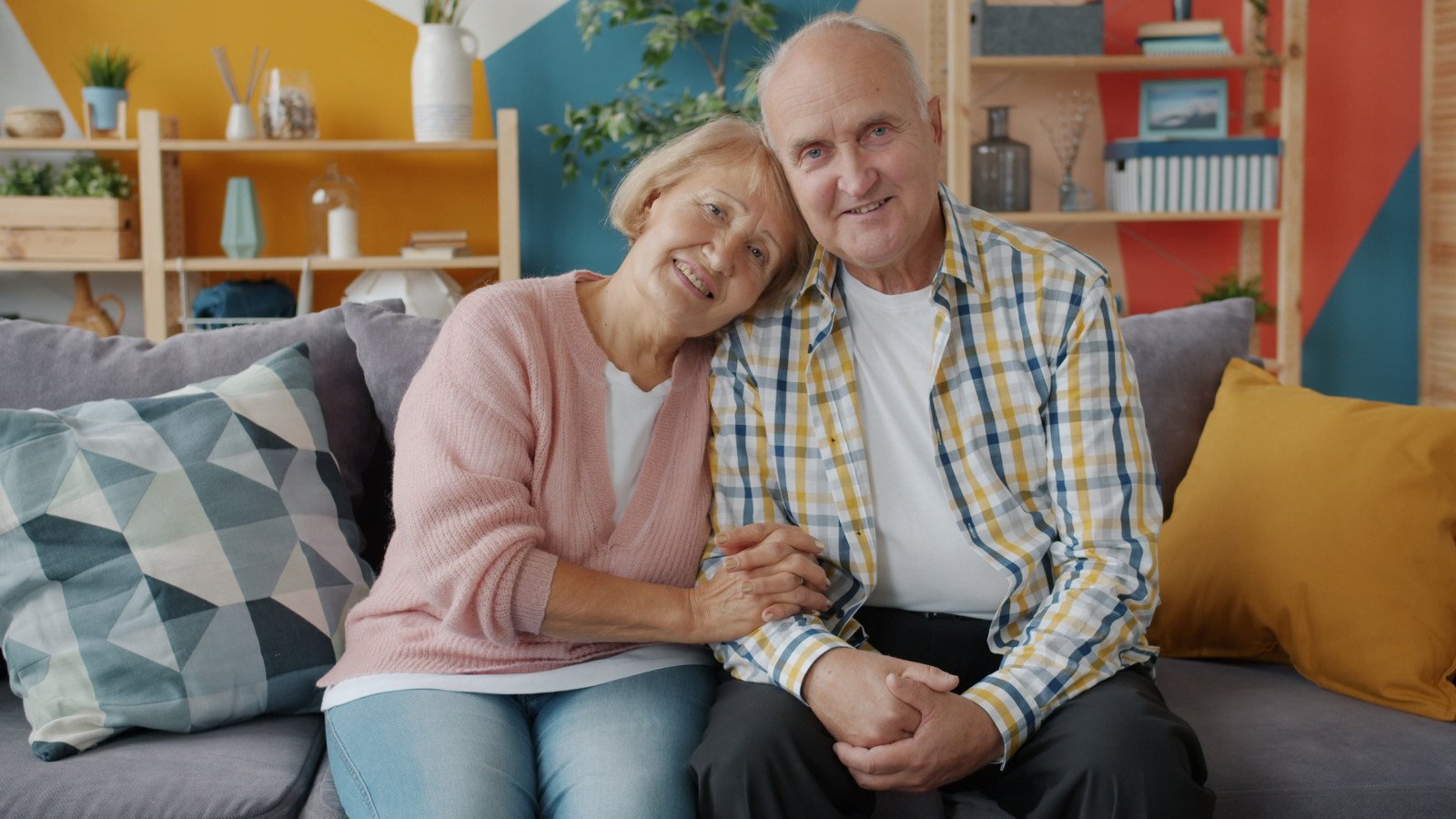 An elderly couple at a retirement community in India, representing the due-diligence decisions families face before signing a senior living agreement